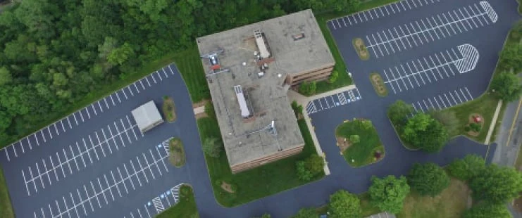An aerial view of a parking lot.