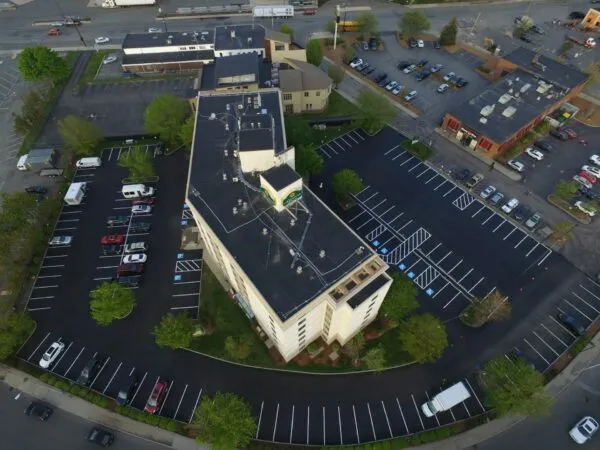 An aerial view of a parking lot.