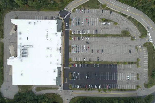 An aerial view of a parking lot.