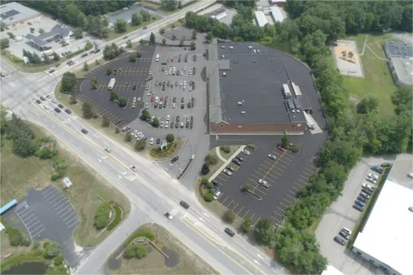 An aerial view of a parking lot.
