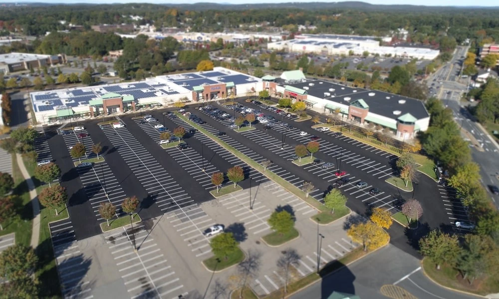 An aerial view of a parking lot.