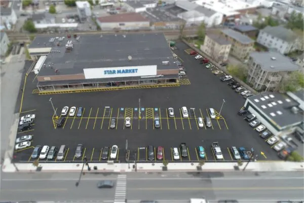 An aerial view of a parking lot.