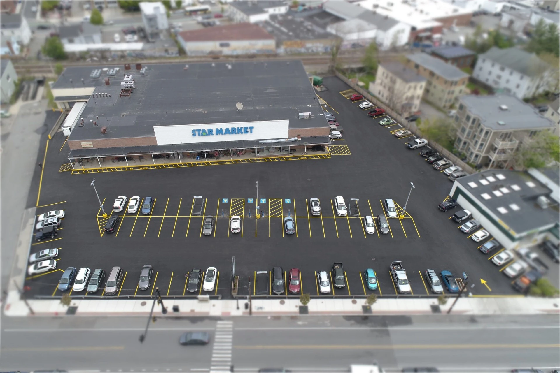 An aerial view of a parking lot.