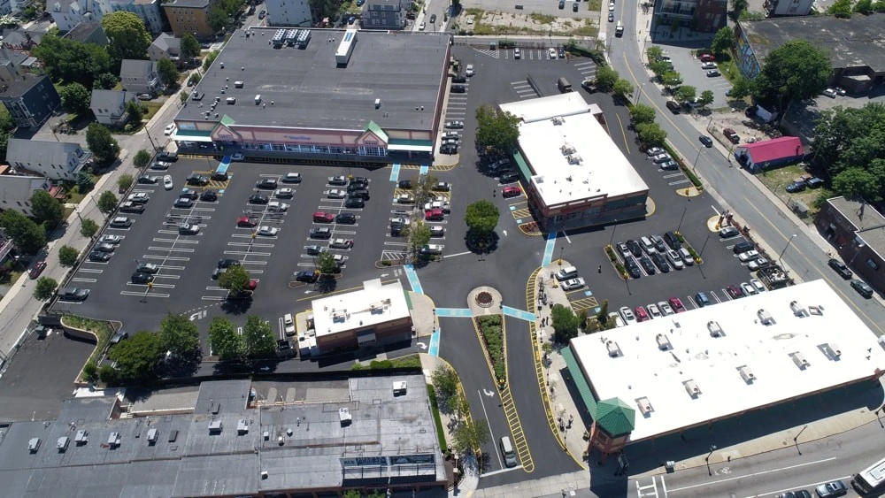 An aerial view of a parking lot. An aerial view of a parking lot.