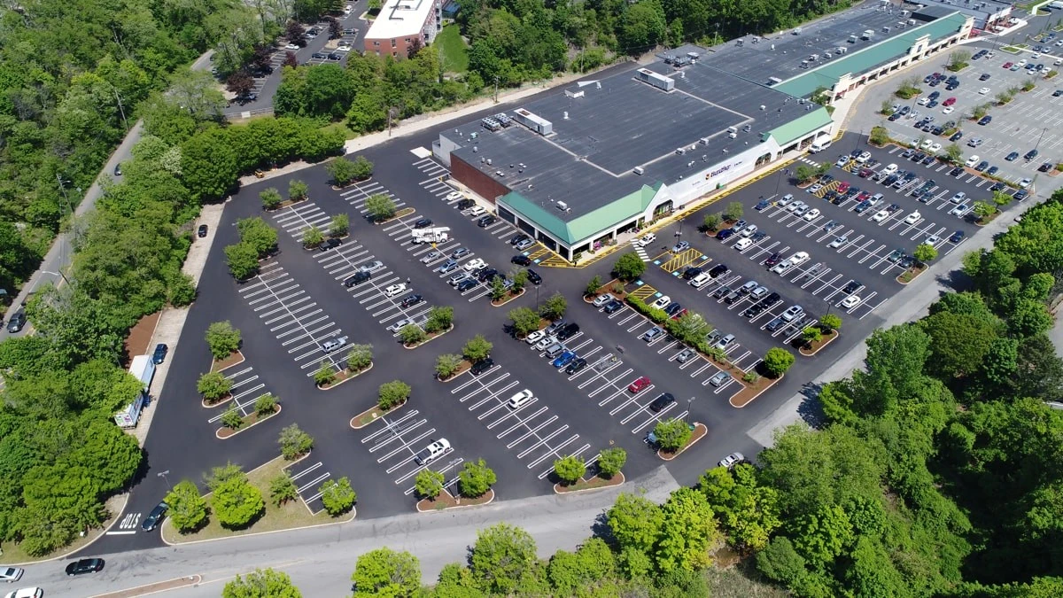 An aerial view of a parking lot.